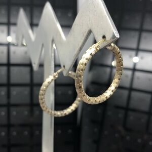 Vintage sterling silver textured round hoop earrings always trend-timeless.